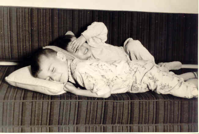 Karen and Steve trying to nap on couch, for the benefit of this publicity shot...