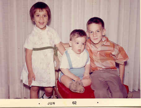 Photo by Uncle Paul of Karen, Larry, Steve w chair