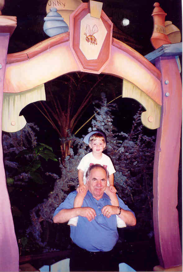 Gabriel way up on Grandpa's shoulders...